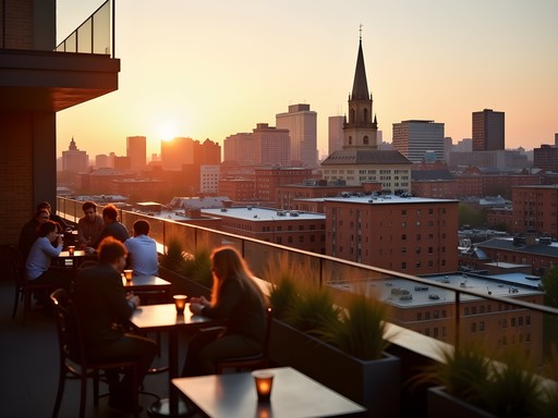 Sunset view from Durham Hotel rooftop bar overlooking downtown Durham skyline with historic and modern buildings