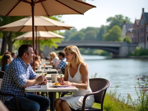 Couple enjoying riverside cafe dining along the Fox River in downtown Waukesha