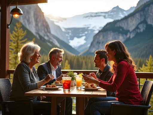 Family enjoying meal at restaurant terrace with mountain views in Banff