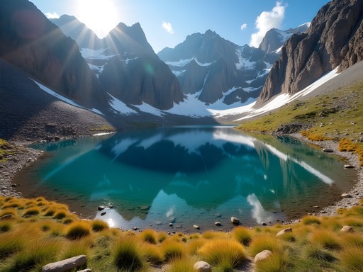 White Pine Lake in Little Cottonwood Canyon with early autumn snow dusting on surrounding peaks