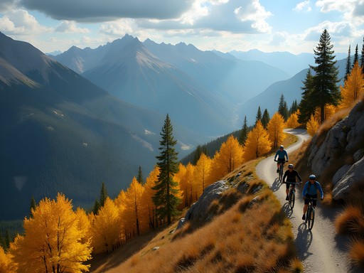 Mountain bikers on Wasatch Crest Trail with golden aspen trees and Utah mountain views