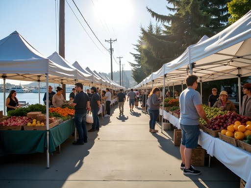 Outdoor farmers market at Jack London Square Oakland waterfront with vendor tents and shoppers
